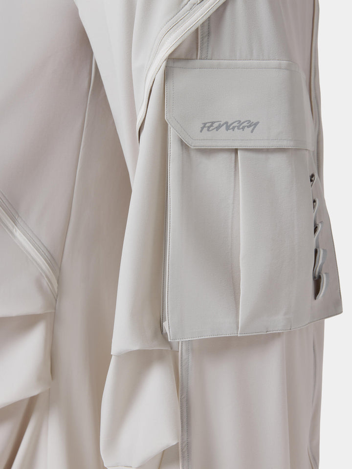The flap cargo pocket on the leg of the DualZip Utility Cargo Pant in Frost Gray