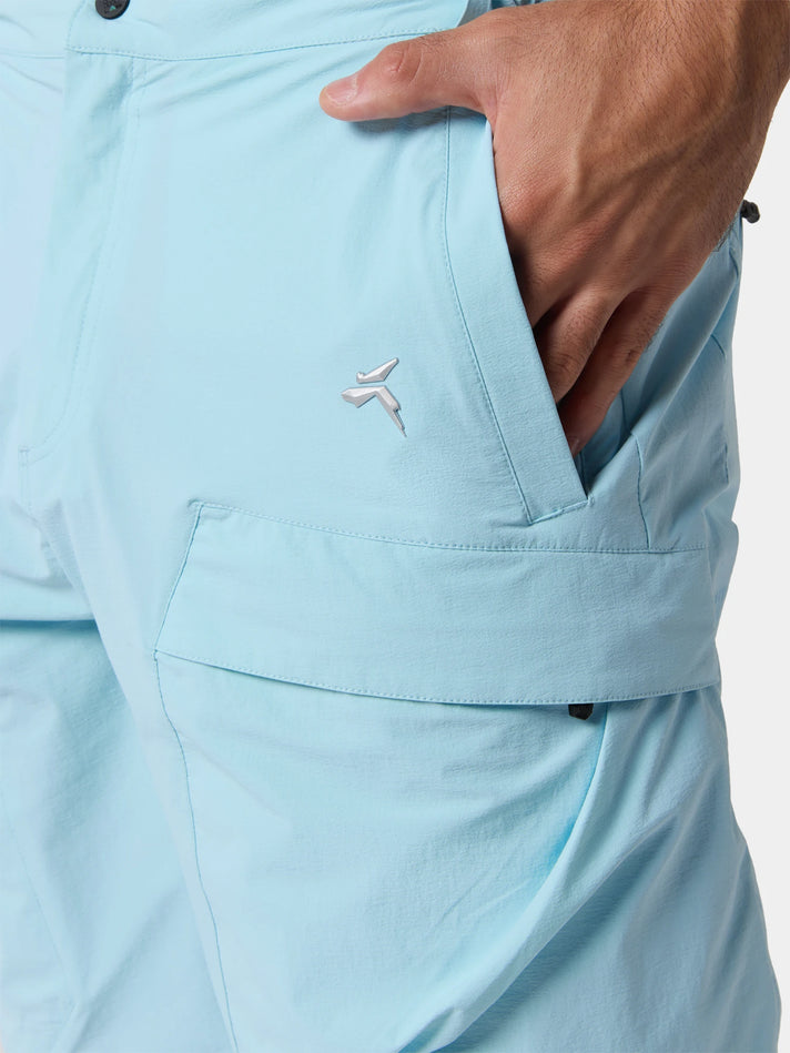 Macro of the cargo pocket and Tittallon mark on the Glacier Blue shorts