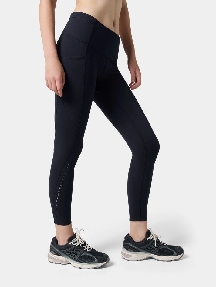 Fenggy Eclipse Contour Motion Pant in Eclipse Navy, full figure on a pale studio ground