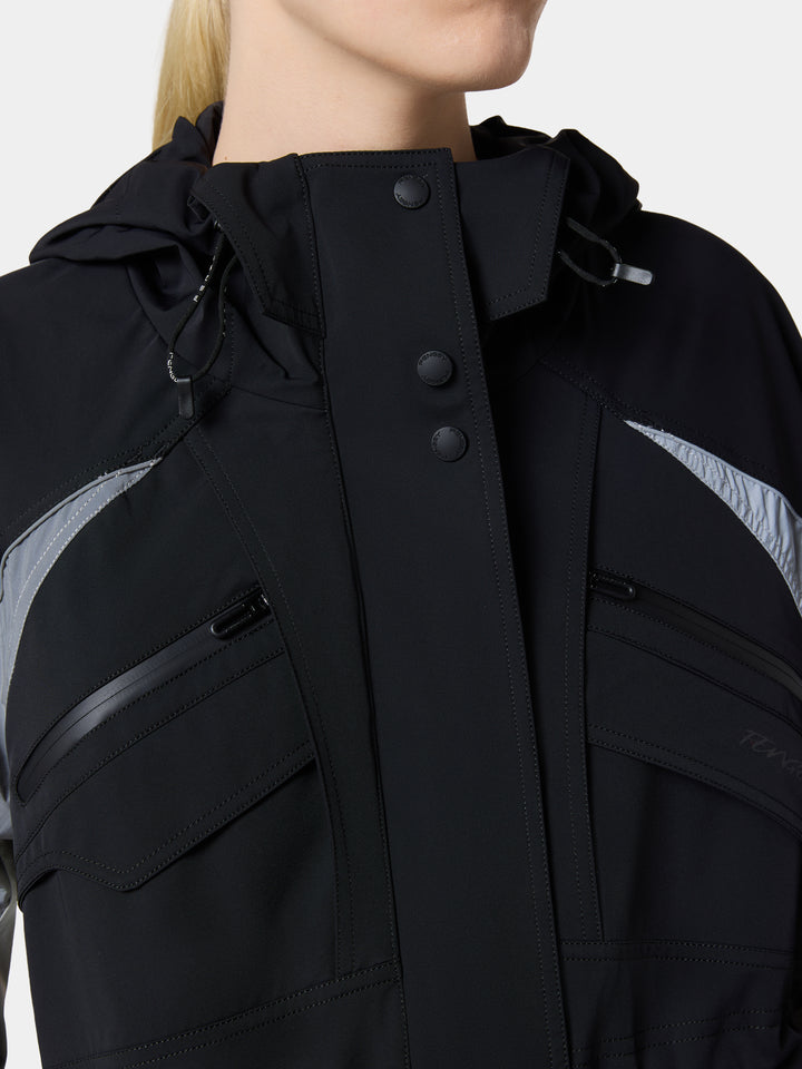 The snap collar and zip chest pockets of the ApexShell Colorblock Shell Jacket in Obsidian Black