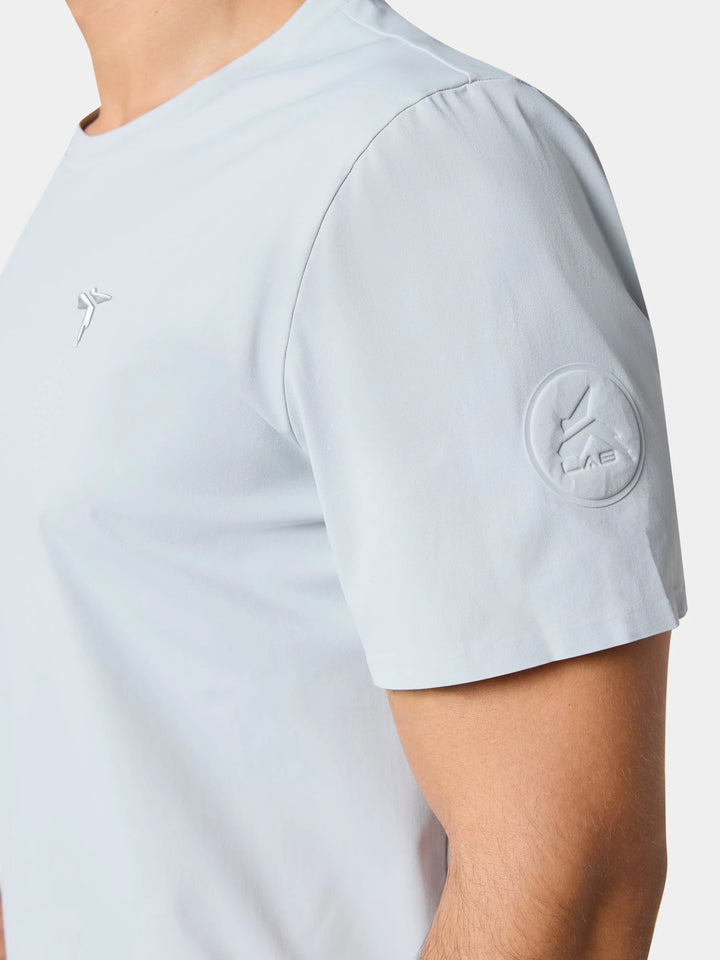 The sleeve badge and shoulder of the Active Life Knitted Quick-Dry Relaxed Sport T-Shirt in Frost Gray