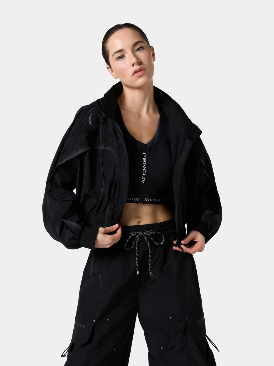 Fenggy FlexFit Reflective Windbreaker Jacket in Obsidian Black, full figure front view over black wide pants