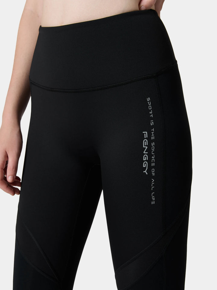 The high waistband and printed side of the FlexCurve Motion Sculpt Pant in Obsidian Black / Celadon Green