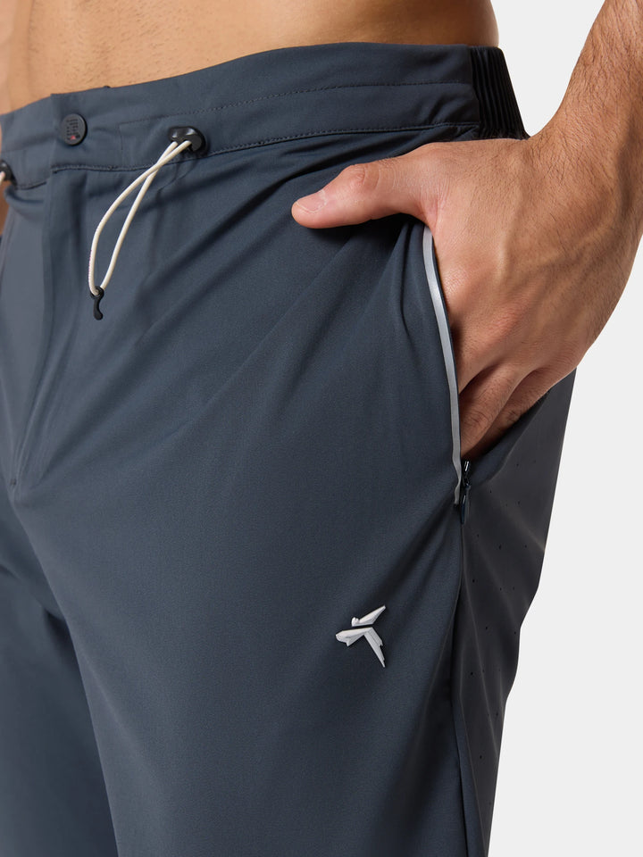 The drawcord waist and a hand in the side pocket of the Active Life Sports Drawstring Jogger in Obsidian Gray
