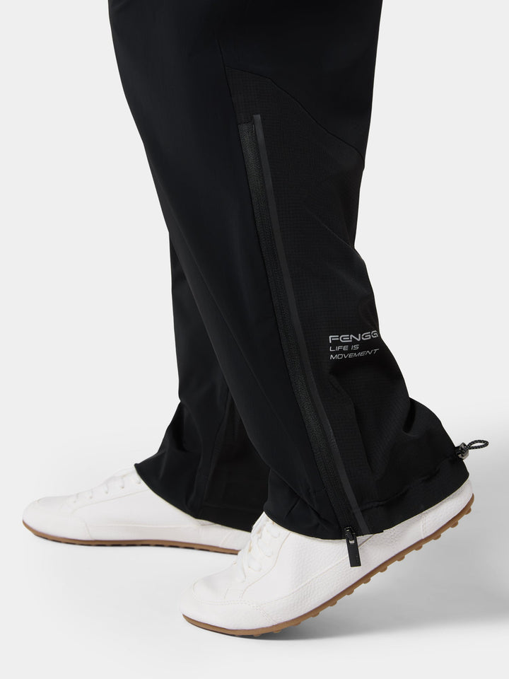 The side zip at the hem of the Cloudform Ergonomic Motion Pant in Obsidian Black