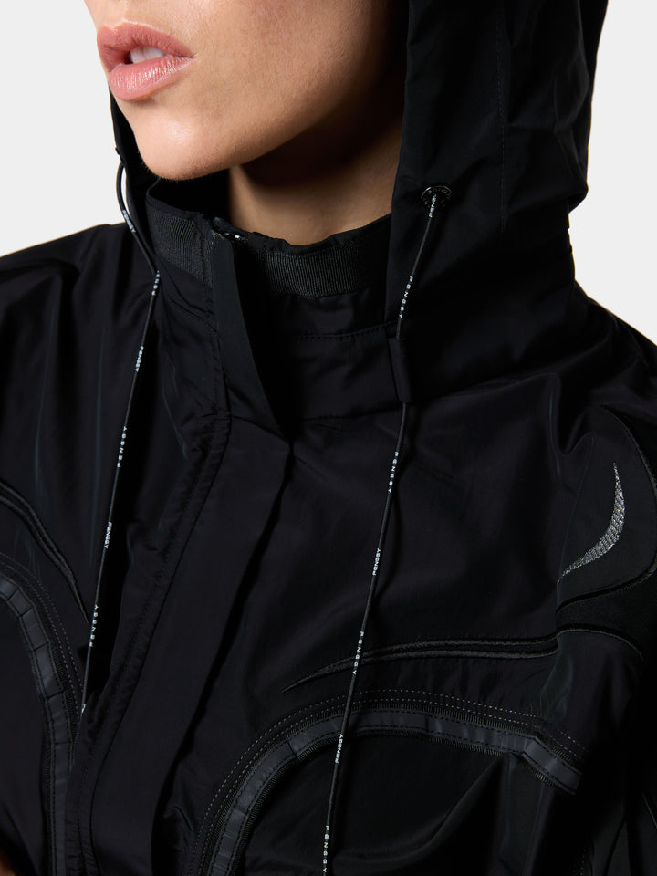 The hood and high zip collar of the FlexFit Reflective Windbreaker Jacket in Obsidian Black