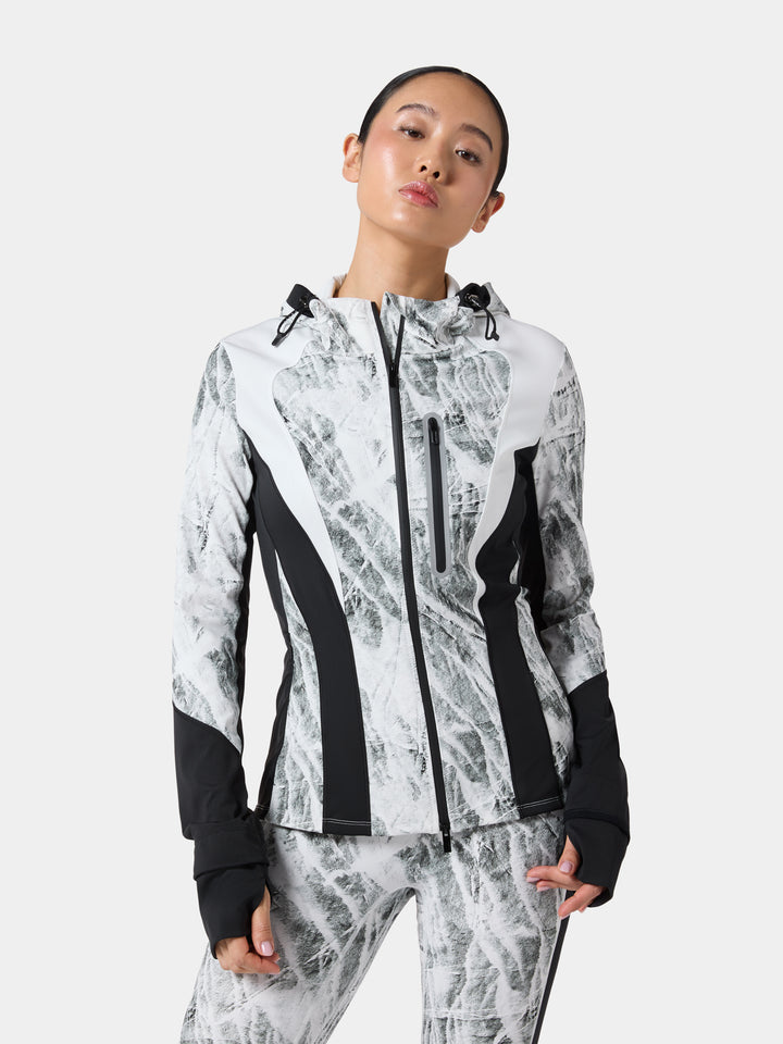 Fenggy PulseForm Training Jacket in Obsidian Black / Frost Marble, full figure on a pale studio ground